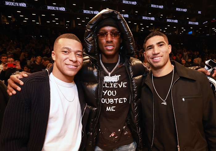 Sauce Gardner with soccer stars Kylian Mbappé and Achraf Hakimi.
